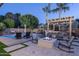 Resort-style backyard oasis with pool, fire pit, and lush landscaping at 3237 E Park Ave, Gilbert, AZ 85234