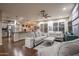 Spacious living room featuring hardwood floors, neutral tones, and open floorplan is perfect for gatherings at 3237 E Park Ave, Gilbert, AZ 85234
