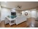 Bright living area with comfortable seating, hardwood floors, and neutral walls makes the room welcoming at 3237 E Park Ave, Gilbert, AZ 85234