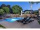 Relax by the sparkling pool in this private backyard at 3237 E Park Ave, Gilbert, AZ 85234