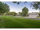 Charming street view showcasing well-maintained lawns, mature trees, and attractive single-Gathering homes at 3237 E Park Ave, Gilbert, AZ 85234