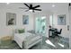 Bright bedroom features a ceiling fan, sliding glass door to patio, and a stylish modern decor at 3401 N 37Th St # 14, Phoenix, AZ 85018