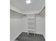 Walk-in closet features a built-in shelving unit for optimal organization and storage space at 3401 N 37Th St # 14, Phoenix, AZ 85018