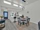 Bright dining area adjacent to the kitchen, featuring a stylish table and modern pendant lighting at 3401 N 37Th St # 14, Phoenix, AZ 85018