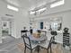 Charming dining area with stylish table, modern lighting, and adjacent kitchen with bar seating at 3401 N 37Th St # 14, Phoenix, AZ 85018