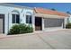 Charming exterior elevation with red tile roof, private garage, and decorative ironwork at 3401 N 37Th St # 14, Phoenix, AZ 85018