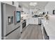 Stylish kitchen with stainless steel appliances, quartz countertops, and ample cabinet space at 3401 N 37Th St # 14, Phoenix, AZ 85018