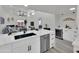 Open-concept kitchen with quartz countertops, stainless steel appliances, and easy access to the living area at 3401 N 37Th St # 14, Phoenix, AZ 85018