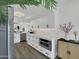 Modern kitchen with white cabinets, stainless appliances, and a spacious layout at 3401 N 37Th St # 14, Phoenix, AZ 85018