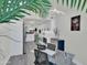 Bright eat-in kitchen featuring white cabinetry, stainless appliances, and a contemporary design at 3401 N 37Th St # 14, Phoenix, AZ 85018