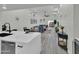 View of the dining and living areas from the kitchen, showcasing the home's open floor plan at 3401 N 37Th St # 14, Phoenix, AZ 85018