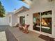 Back patio features desert landscaping and a sitting area perfect for enjoying the outdoors at 3401 N 37Th St # 14, Phoenix, AZ 85018