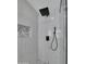 Modern shower has rain head, handheld wand, marble-look tile surround and decorative niche at 3401 N 37Th St # 14, Phoenix, AZ 85018