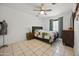 Simple bedroom featuring a bed with a quilt and neutral walls at 3701 E Karen Dr, Phoenix, AZ 85032