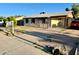 View of single story home with carport and driveway on a sunny day at 3701 E Karen Dr, Phoenix, AZ 85032