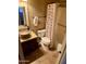 Bathroom boasting a granite countertop with a vessel sink, shower/tub combo, and tiled floors at 4018 E Adobe Dr, Phoenix, AZ 85050