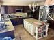 Spacious kitchen with a center island, granite countertops and stainless steel appliances at 4018 E Adobe Dr, Phoenix, AZ 85050