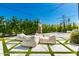 Seating area in backyard with a basketball court is perfect for relaxation and outdoor fun at 4021 E Glenrosa Ave, Phoenix, AZ 85018