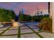 A backyard featuring a basketball court and lush greenery, perfect for outdoor activities and relaxation at 4021 E Glenrosa Ave, Phoenix, AZ 85018