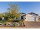 Charming home with brick accents, a white picket fence, and a well-manicured lawn at 4021 E Glenrosa Ave, Phoenix, AZ 85018