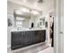 Spacious bathroom with a double vanity and lots of storage space at 4046 S 58Th Ln, Phoenix, AZ 85043