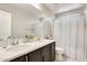 Bright bathroom featuring a double vanity and modern fixtures at 4046 S 58Th Ln, Phoenix, AZ 85043