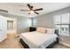 Bright bedroom with a comfy bed and lots of natural light at 4046 S 58Th Ln, Phoenix, AZ 85043