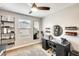 Well-lit bedroom featuring a vanity with storage, modern decor, and a cozy atmosphere at 4046 S 58Th Ln, Phoenix, AZ 85043