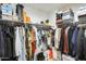 Walk-in closet with shelves and racks for ample storage at 4046 S 58Th Ln, Phoenix, AZ 85043