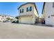 Exterior view of a two-story home featuring a two-car garage and neat landscaping at 4046 S 58Th Ln, Phoenix, AZ 85043