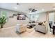 Bright living room featuring modern decor, stylish furnishings, and a cozy, inviting atmosphere at 4046 S 58Th Ln, Phoenix, AZ 85043