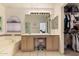 Bathroom with double sink vanity and tiled shower-tub combination at 4441 E Desert Wind Dr, Phoenix, AZ 85044