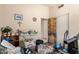 Bedroom featuring a closet with colorful sliding doors and neutral walls at 4441 E Desert Wind Dr, Phoenix, AZ 85044