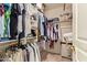 Walk-in closet with ample storage space and organized shelving at 4441 E Desert Wind Dr, Phoenix, AZ 85044