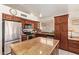 Well-equipped kitchen with stainless steel appliances and a large center island with granite countertops at 4441 E Desert Wind Dr, Phoenix, AZ 85044