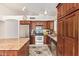 Inviting kitchen with stainless steel appliances, granite countertops, and ample cabinet space at 4441 E Desert Wind Dr, Phoenix, AZ 85044