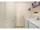 Laundry room with washer, dryer, and 
