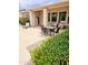 Inviting back patio with stylish outdoor seating and a well-manicured garden view at 4628 W Whispering Wind Dr, Glendale, AZ 85310