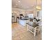 Modern kitchen with stainless steel appliances, granite countertops, and ample cabinet space at 4628 W Whispering Wind Dr, Glendale, AZ 85310
