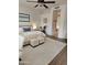 Well-lit main bedroom with neutral tones and an ensuite bathroom view at 4628 W Whispering Wind Dr, Glendale, AZ 85310