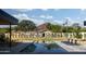 Backyard featuring a long pool, lounge chairs on the patio, lawn area, and mountain views at 4864 E Lafayette Blvd, Phoenix, AZ 85018