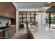 Open kitchen with professional-grade appliances, marble countertops, and a breakfast nook with bench seating at 4864 E Lafayette Blvd, Phoenix, AZ 85018