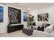 Stylish living room with a comfortable sofa, modern decor, large windows, and chic accents at 4920 W Walatowa St, Laveen, AZ 85339