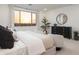 This main bedroom features a luxury padded headboard, mountain views and sitting area at 4920 W Walatowa St, Laveen, AZ 85339