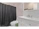 Updated bathroom with a sleek vanity, modern fixtures, and stylish design at 5226 W Redfield Rd, Glendale, AZ 85306