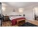 Comfortable bedroom featuring a spacious layout, hardwood floors, and natural light at 5226 W Redfield Rd, Glendale, AZ 85306