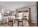Eat in kitchen provides a casual dining space, connecting indoor comfort to outdoor enjoyment with backyard access at 5226 W Redfield Rd, Glendale, AZ 85306
