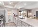 Efficient kitchen with a view to the pool area, features a pass through door for ultimate access at 5226 W Redfield Rd, Glendale, AZ 85306