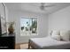 Bright bedroom featuring a serene outdoor view and neutral decor at 5341 E Sheena Dr, Scottsdale, AZ 85254