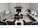 Comfortable living room featuring a fireplace and neutral decor at 5341 E Sheena Dr, Scottsdale, AZ 85254